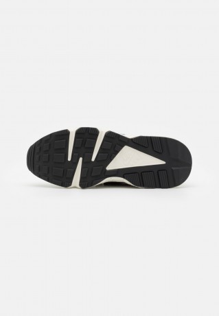 Nike Sportswear AIR HUARACHE UNISEX Sneaker low light bone/university gold/black/lethal pink AIR HUARACHE UNISEX Низкие кроссовки женские светлая кость/университетское золото/черный/смертоносно-розовый
