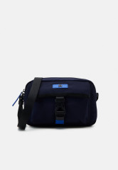 Tommy Hilfiger MODERN UTILITY REPORTER UNISEX Across body bag space blue MODERN UTILITY REPORTER UNISEX Сумка через плечо космический синий