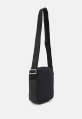 Tommy Hilfiger CENTRAL REPREVE MINI REPORTER UNISEX Across body bag space blue CENTRAL REPREVE MINI REPORTER UNISEX Сумка через плечо космический синий